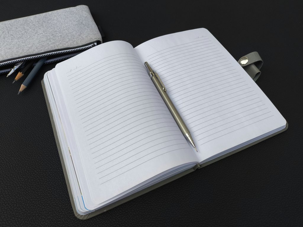 organized notebook with task list for 1-3-5 rule productivity
