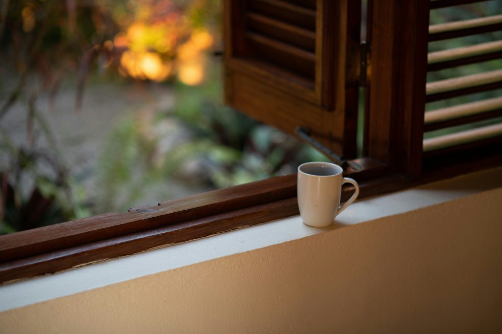 morning energy management productivity with coffee by the window