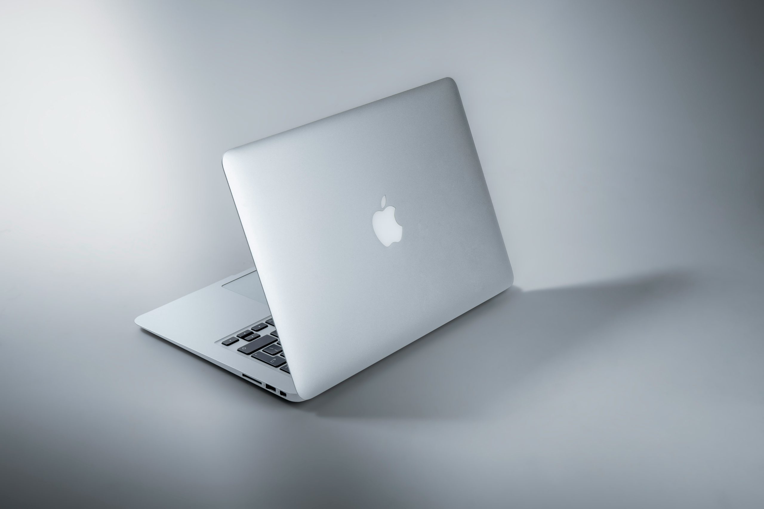 clean laptop workspace for organizing remote work with notion templates