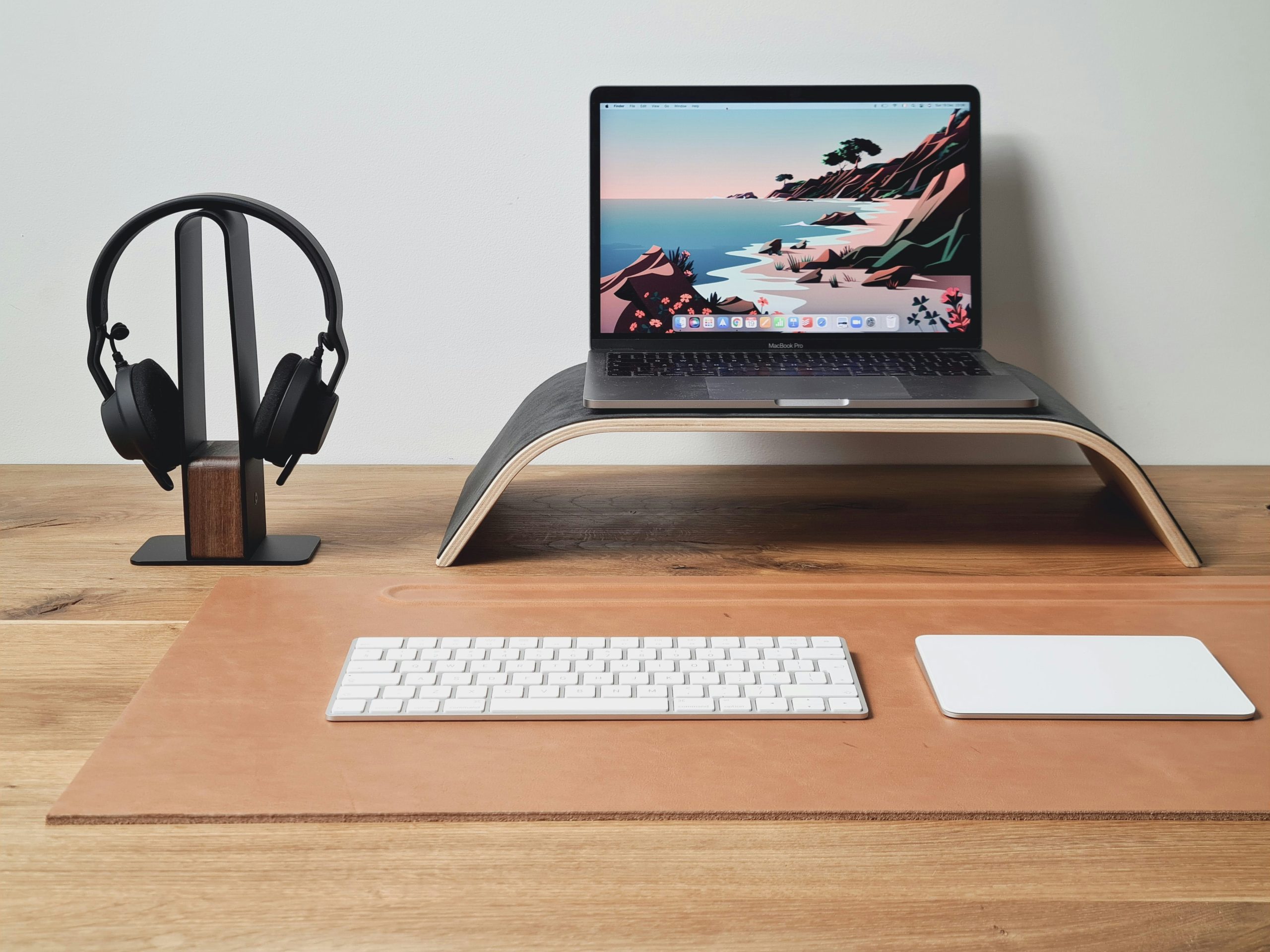 laptop on wooden desk minimal home office setup
