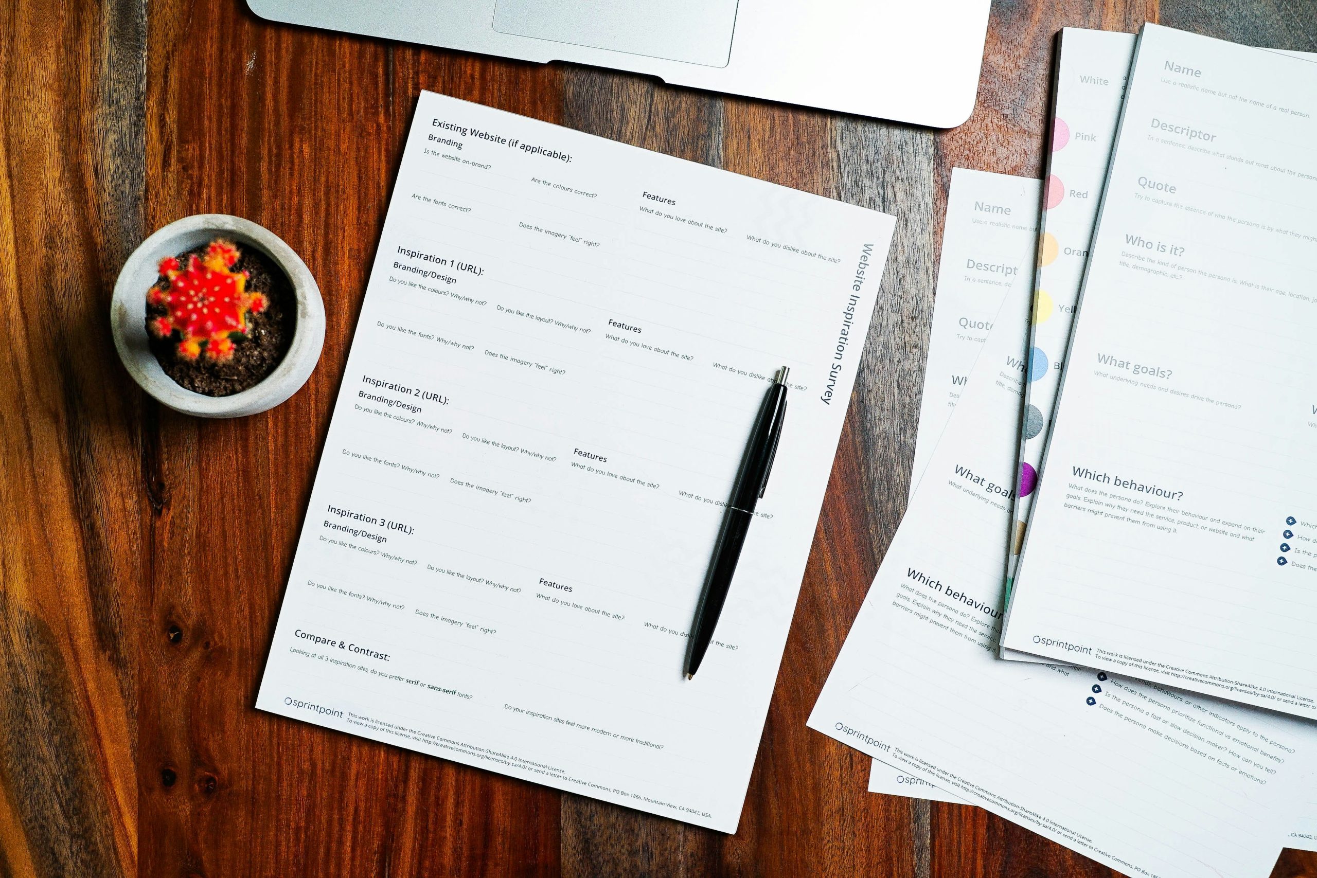 remote work trends 2026 data reports on a wooden desk