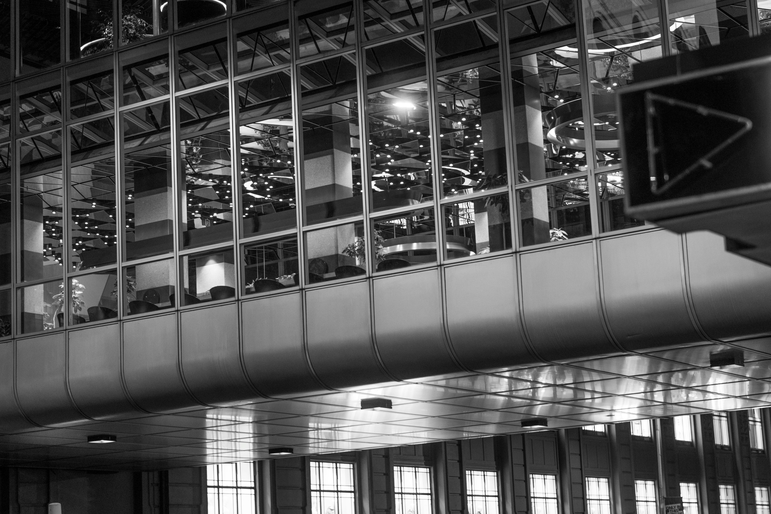 glass office atrium representing transparency at work