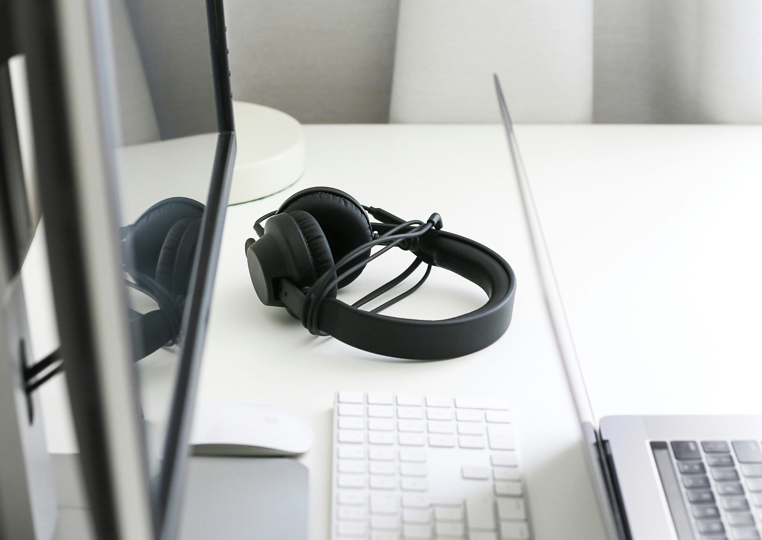 headphones on desk representing zoom fatigue recovery